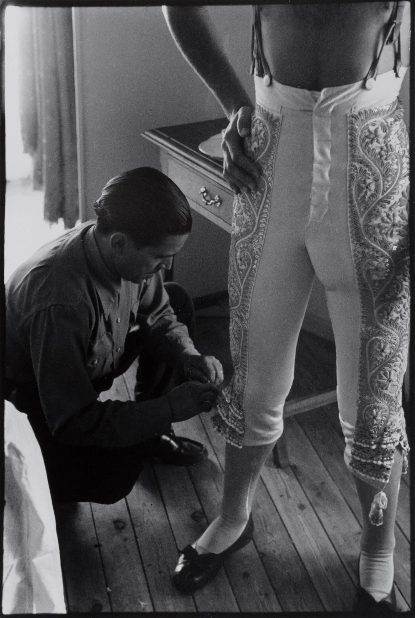 Dressing of the Bullfighter Antonio Ordóñez for the afternoon corrida, Fiesta of San Fermin, Pamplona, Spain